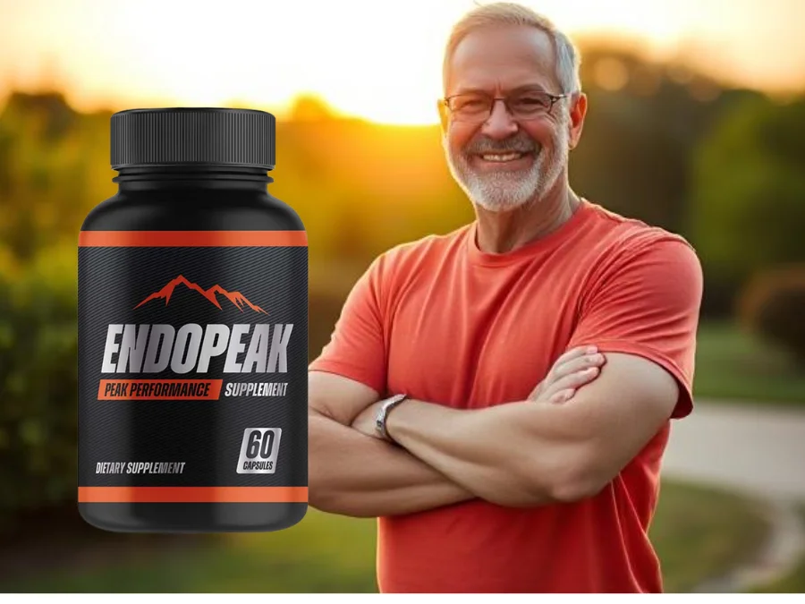 Confident middle-aged man smiling outdoors after using the best vitality supplement for men.